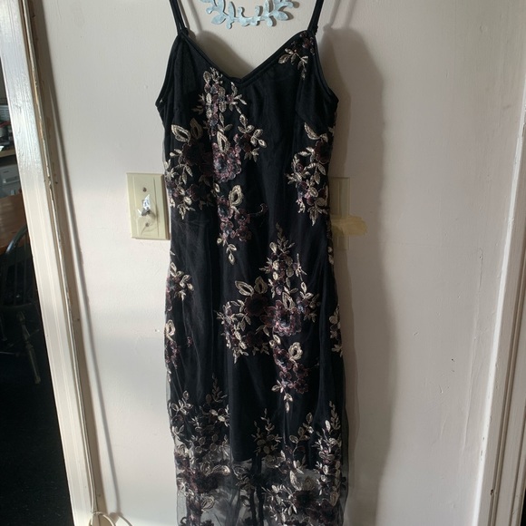 Black dress with embellished appliqués - Picture 2 of 6